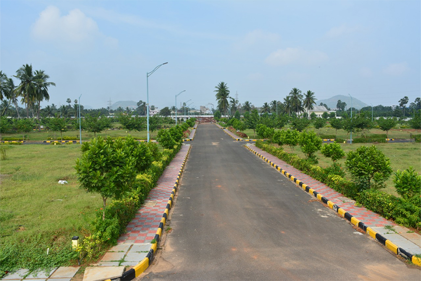 Footpaths with parking tiles and eco friendly shaded tree plantation